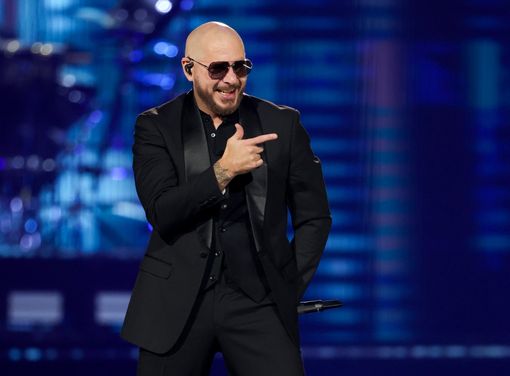 LAS VEGAS, NEVADA - NOVEMBER 24: Pitbull performs during a stop of The Trilogy Tour at T-Mobile Arena on November 24, 2023 in Las Vegas, Nevada. (Photo by Ethan Miller/Getty Images)