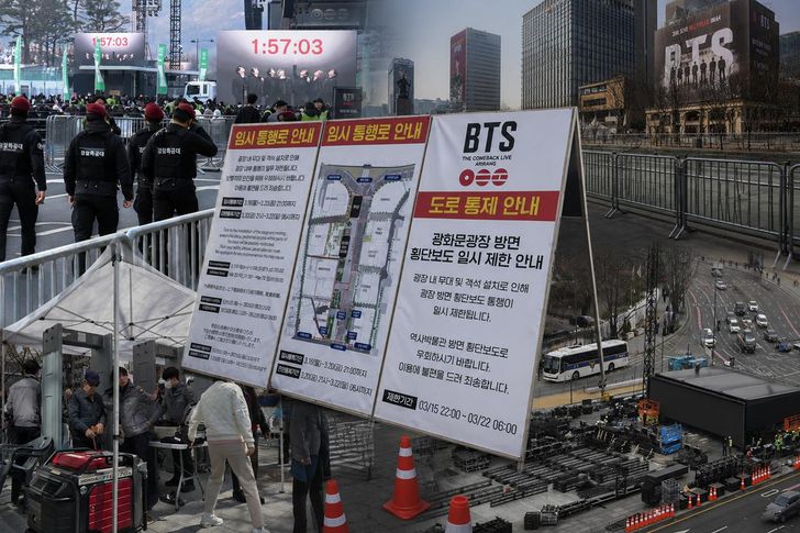 Police officers control traffic and enforce restrictions in central Seoul during the BTS Gwanghwamun concert. Korea Times file