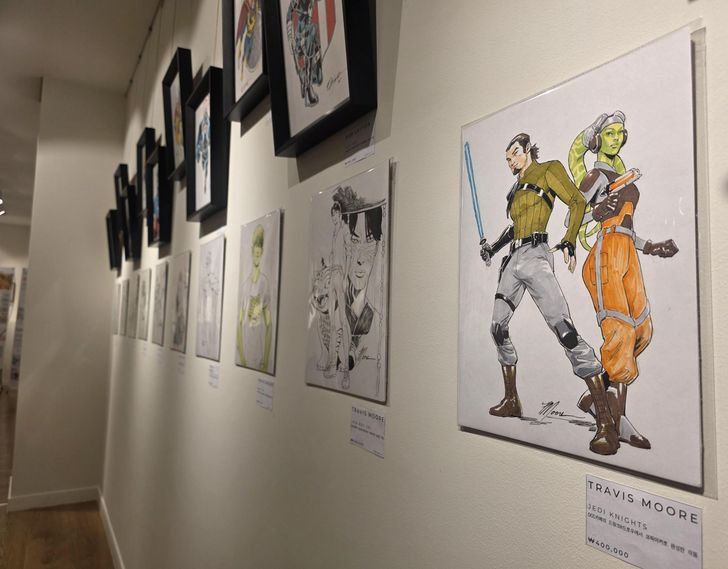 The work of U.S. comic book artist Travis Moore is displayed at Alpha Gallery in central Seoul's Namdaemun Market, July 20. The exhibition continues until Aug. 1. Korea Times photo by Jon Dunbar