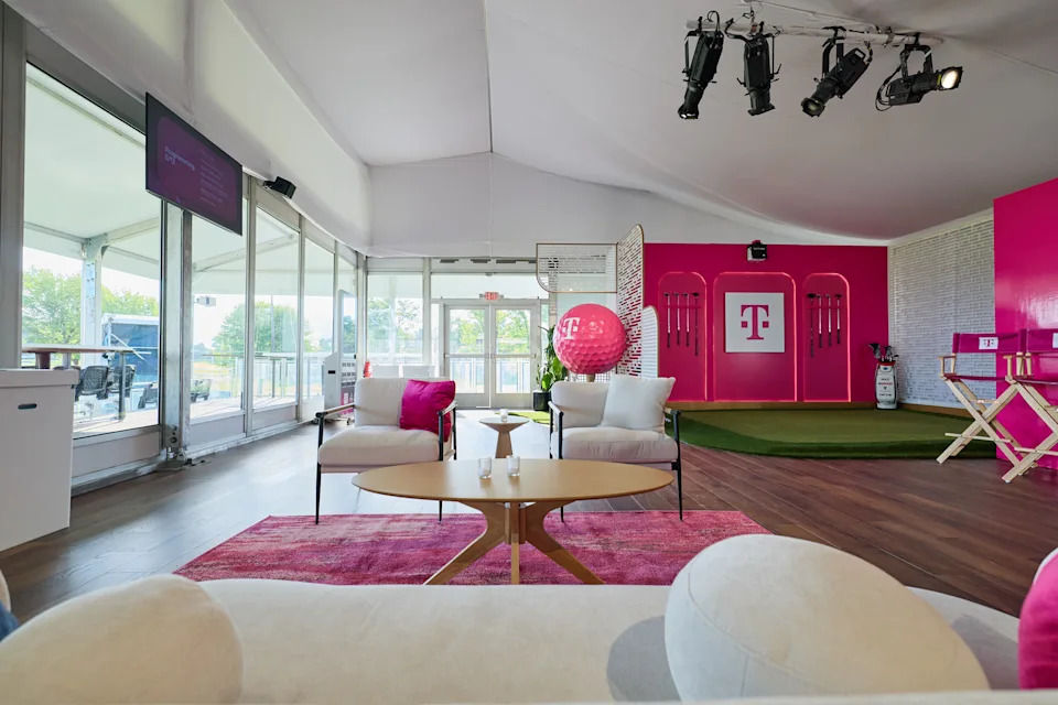 T-Mobile's Club Magenta lounge at the 2026 PGA Championship offered customers complimentary drinks, player appearances, and exclusive giveaways at the 15th green.