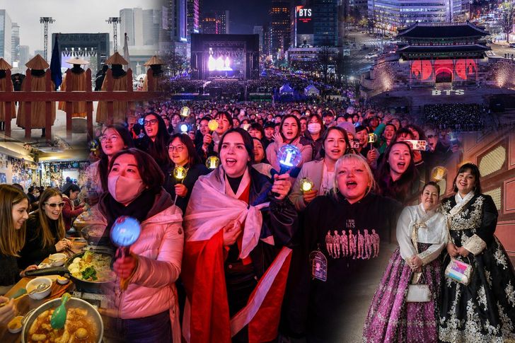 Foreign tourists enjoy a BTS concert in the Gwanghwamun area of Seoul, March 21. Overseas visitors eat tteokbokki and wear hanbok while touring nearby ancient palaces. Korea Times file