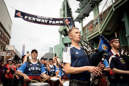 Members of Scotland’s Tartan Army march down Lansdowne Street to Fenway Park before a game between the Texas Rangers and the Boston Red Sox last month.