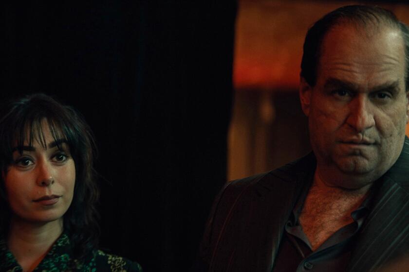 Cristin Milioti, left, and Colin Farrell in THE PENGUIN on HBO.