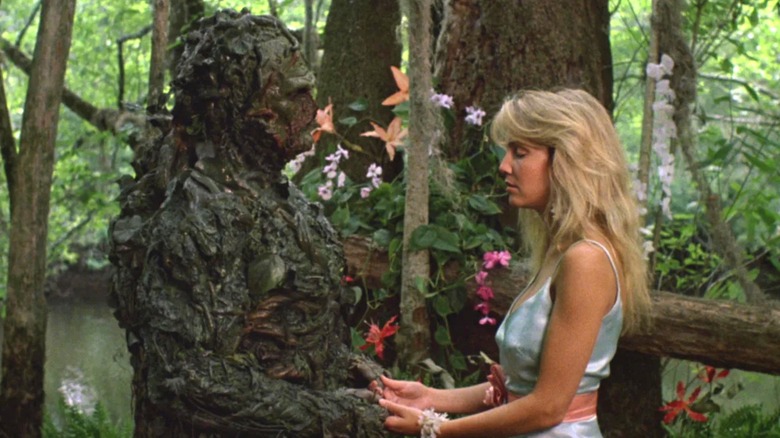 Swamp Thing and Abby holding hands in "The Return of Swamp Thing."