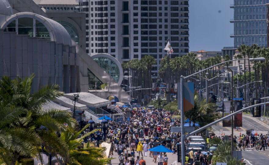 Crowds walk outside the San Diego Convention Center during Comic-Con on July 25, 2025.