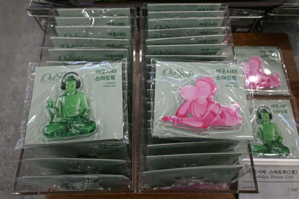 Buddhism-themed phone grips at a souvenir store in Seoul