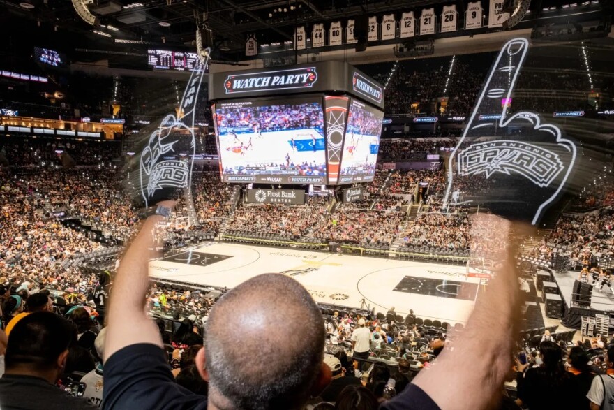 Fans get rowdy as the Spurs close in on a win against the Knicks during the Game 3 watch party at the Frost Bank Center on June 8, 2026.