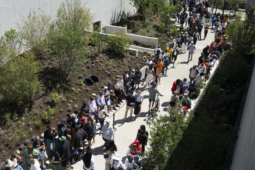 People line up outside the museum at the Obama Presidential Center Museum on the South Side.