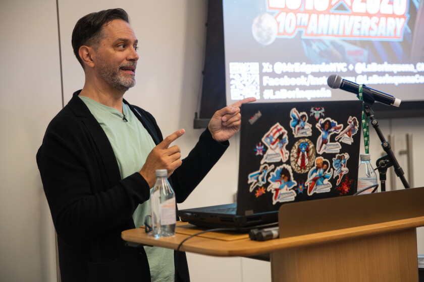 Edgardo Miranda-Rodriguez leads a "create your own superhero" workshop at the Obama Presidential Center.
