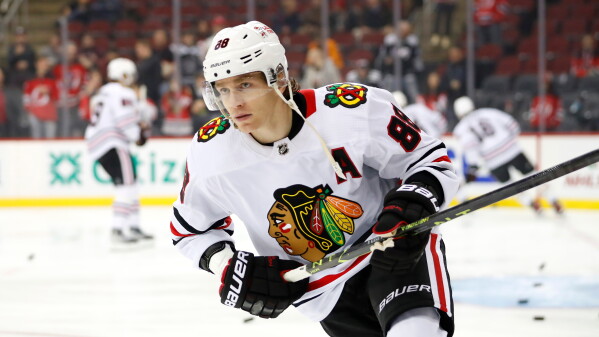 Chicago Blackhawks right wing Patrick Kane (88) skates before an NHL hockey game against the New Jersey Devils, Tuesday, Dec. 6, 2022, in Newark, N.J. (AP Photo/Noah K. Murray, File)