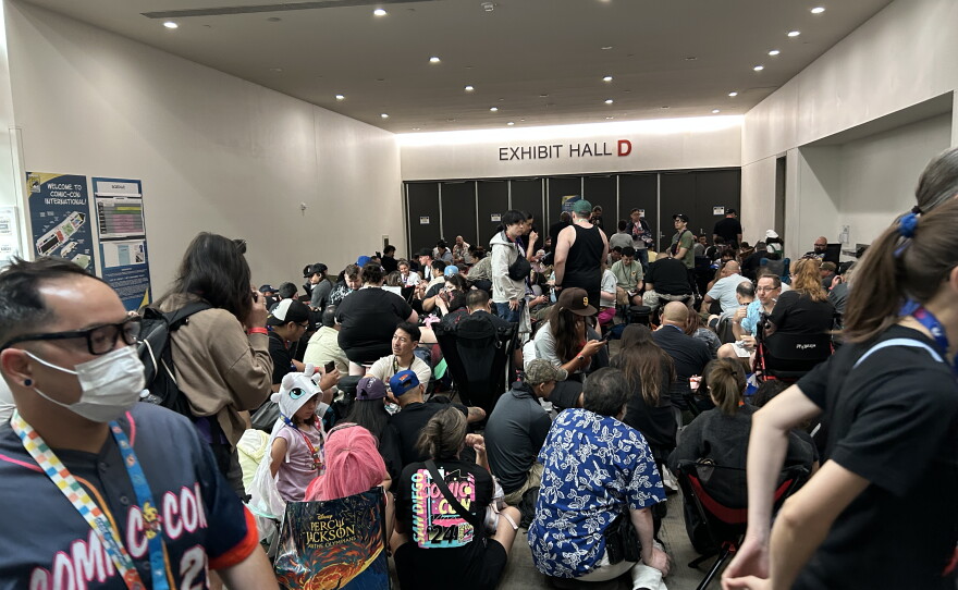 People waiting to enter the exhibit hall at Comic-Con on July 23, 2027.