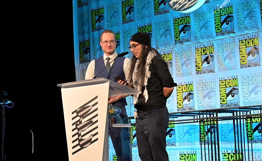Eric Zawadzki and Deniz Camp accepting the Eisner for Best New Series for "Assorted Crisis Events." July 24, 2026