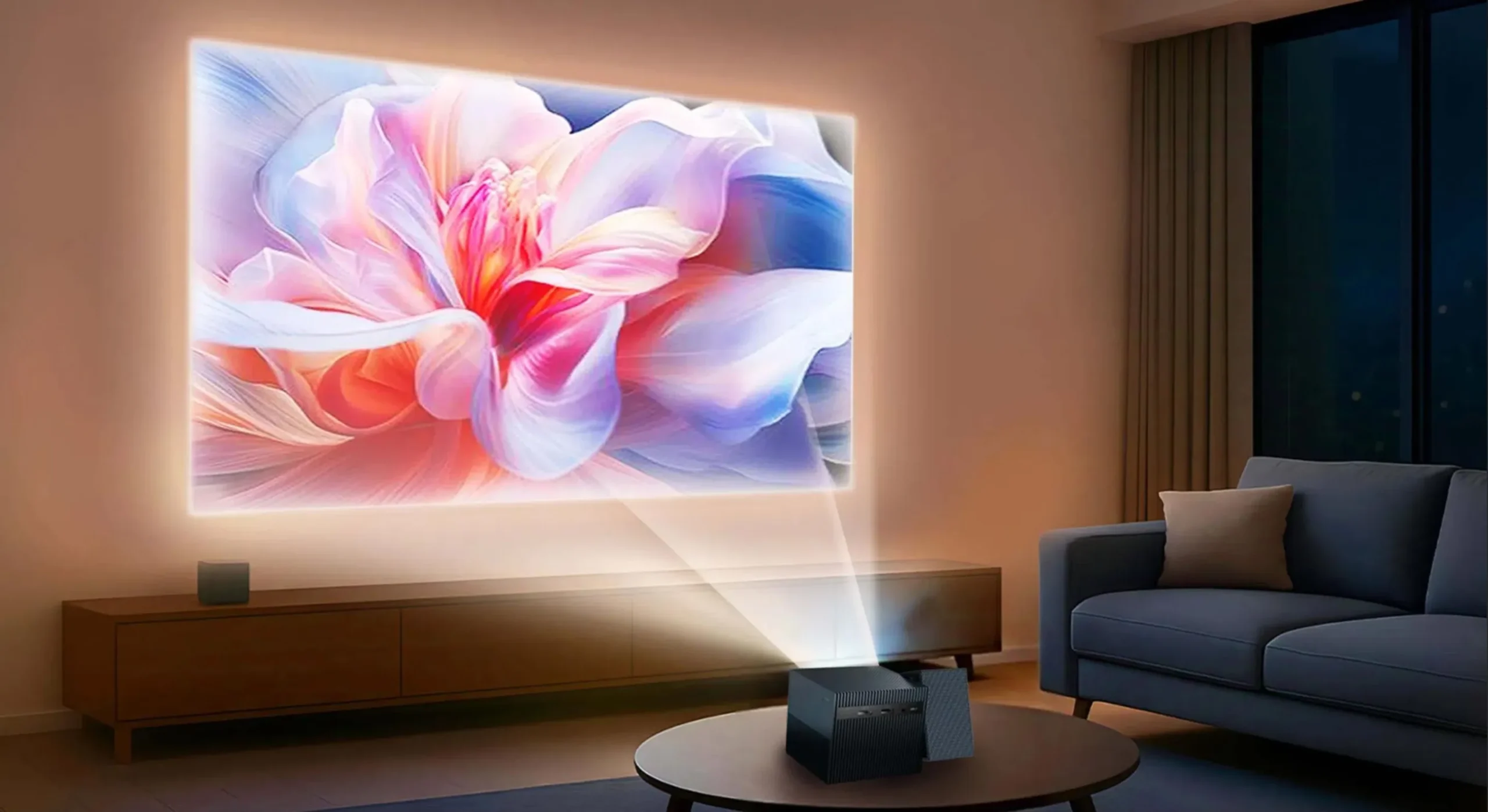 Rated at 750 lumens, the compact cube uses TCL’s color engine to paint vibrant, wall-sized artwork directly from a central coffee table