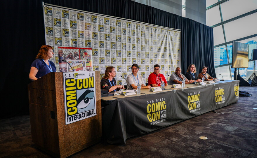 (L to R): Pamela Jackson, Elizabeth Pollard, Grace deVega, Fawaz Qashat, Neil Kendricks, Bradley Medina, and Breanna “Nana” Rohde speaking in the Shiley Special Events Suite, San Diego Central Library at Comic-Con, Internationalon Thursday, July 20, 2023. Panel name: Comics Pedagogy: Teaching Outside the Panel.