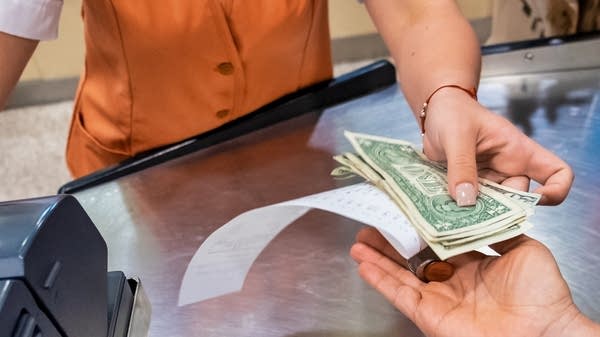 Businesses have passed on the cost of tariffs to customers, resulting in American households having to pay more than $1,700 last year.