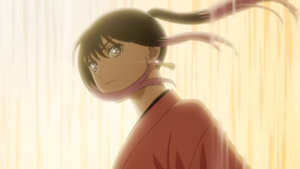 Still from the Akane-banashi anime that depicts Akane, clad in a pink kimono, staring dramatically at the camera as her ponytail flutters behind her