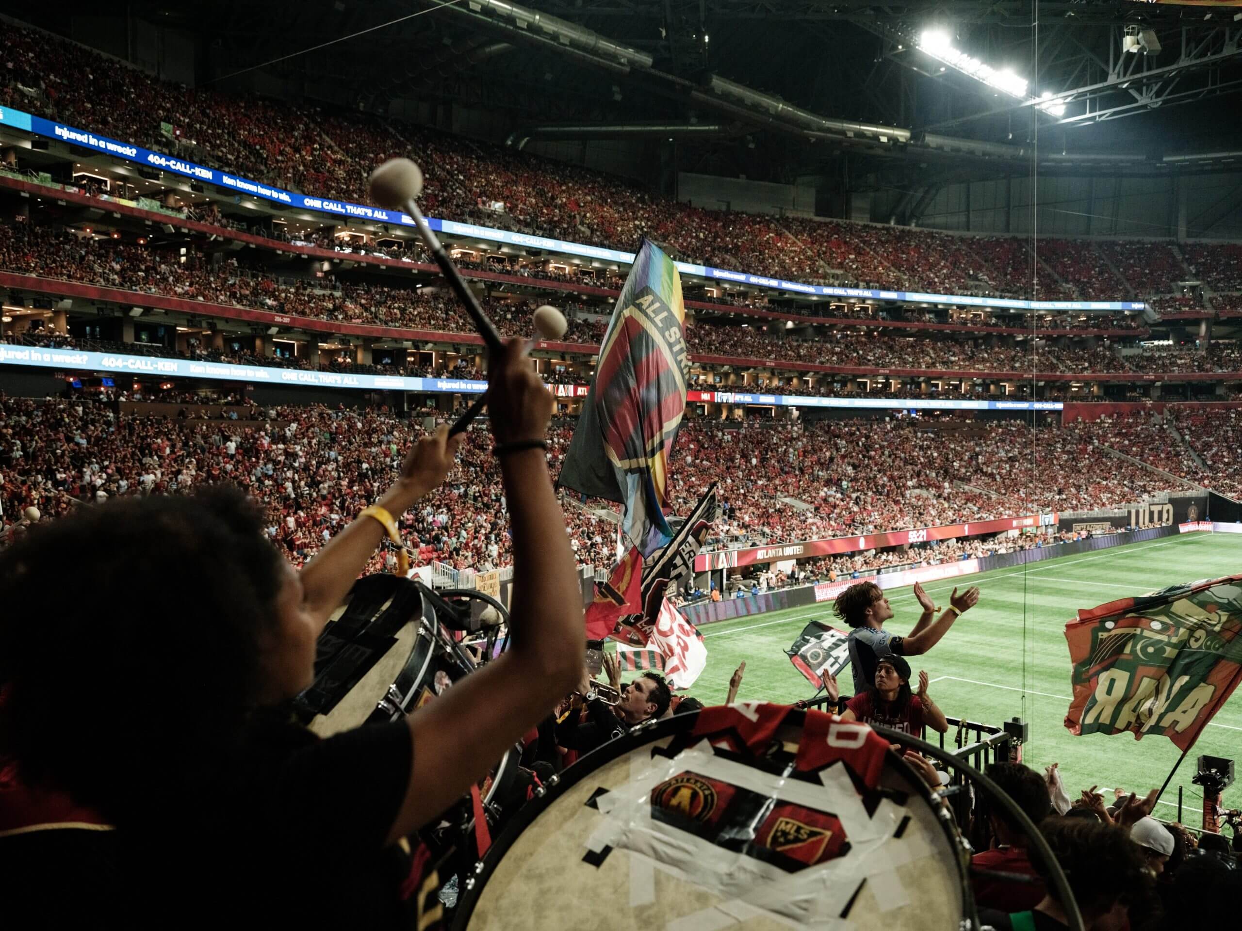 Atlanta fans bang drums during an MLS Cup 2024 playoffs match against Inter Miami at Mercedes-Benz Stadium