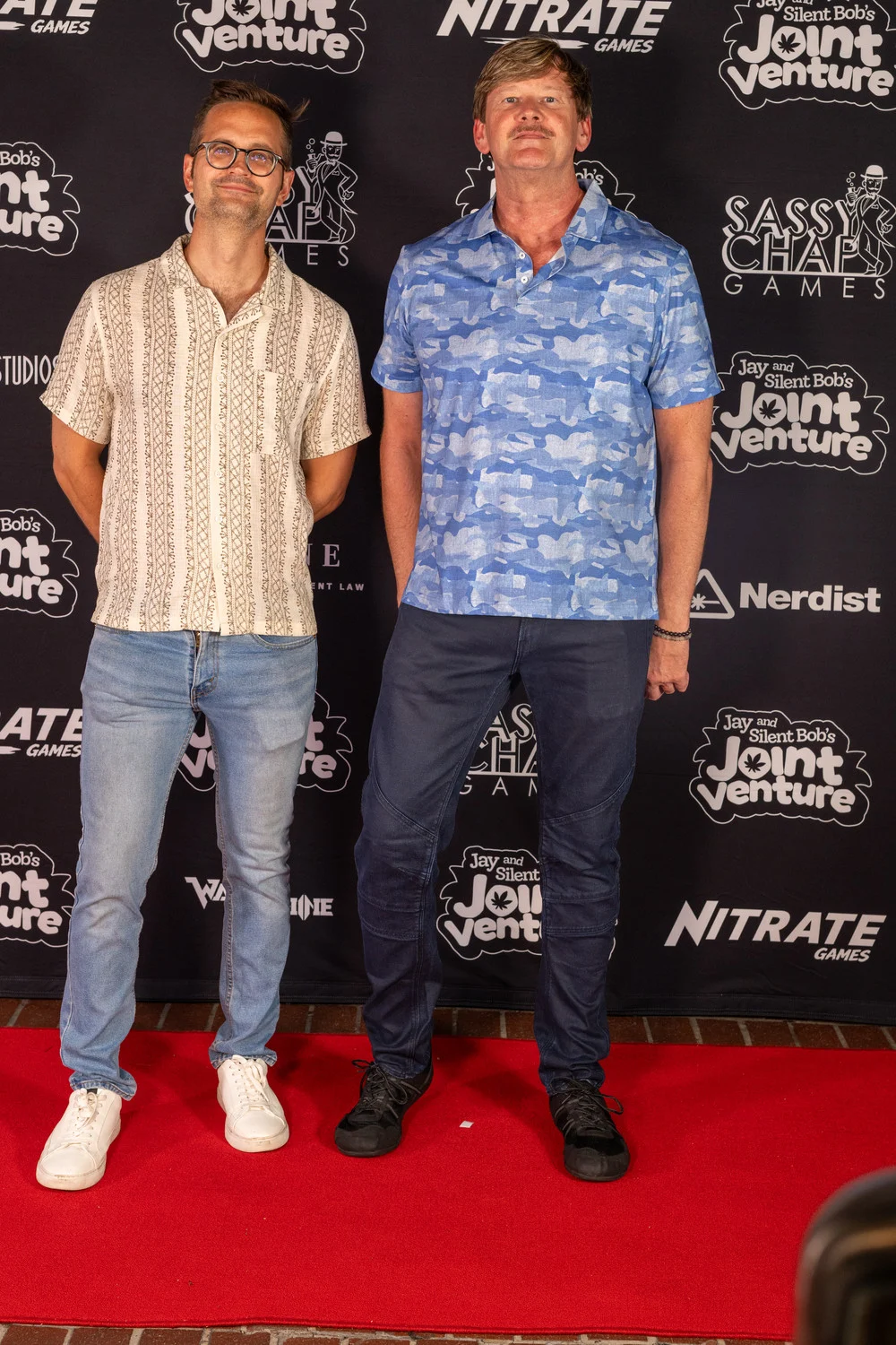 Tim Rauch (StoryCorps) and friend arrive at the Blunt Objects SDCC party