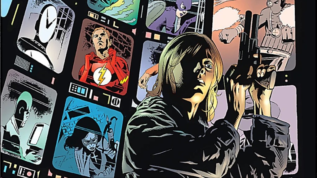Agent Chase standing in front of a wall of screens with superheroes and supervillains on them