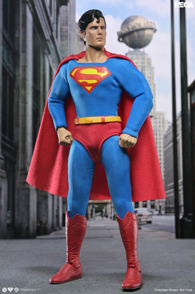 NECA DC 8-inch figures 1978 Christopher Reeve Superman standing in front of Metropolis street background.