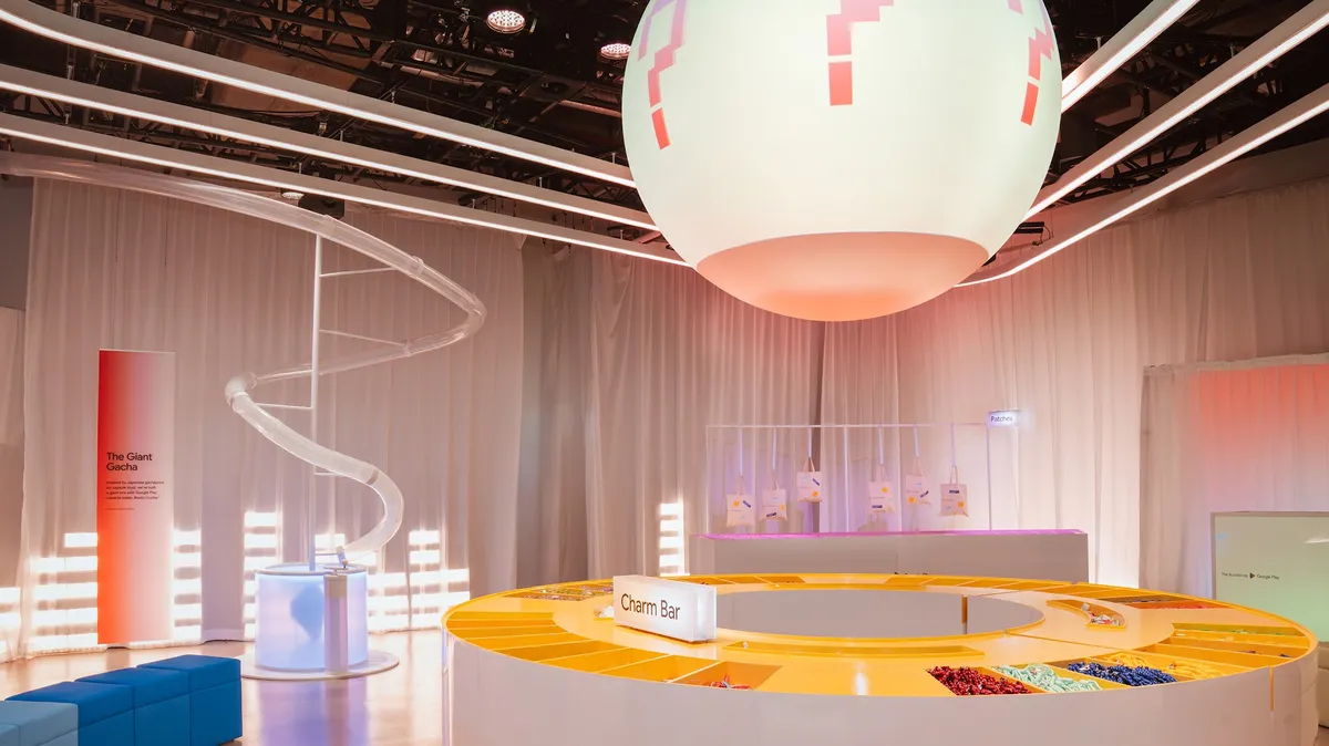 The photo shows the interior of The Auction By Google Play at SDCC