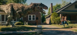 Anne Hathaway and Ewan McGregor Face Down a Dinosaur in New End of Oak Street Clip