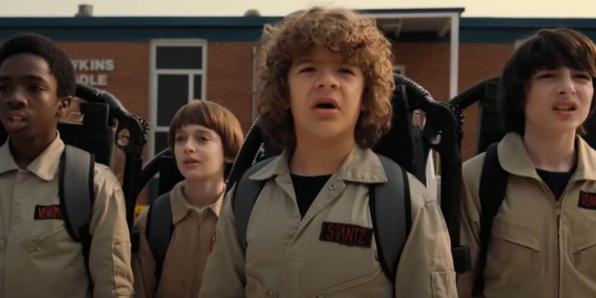 (L to R) Lucas Sinclair (Caleb McLaughlin), Will Byers (Noah Schnapp), Dustin Henderson (Gaten Matarazzo), and Mike Wheeler (Finn Wolfhard) dressed as Ghostbusters in 'Stranger Things' Season 2