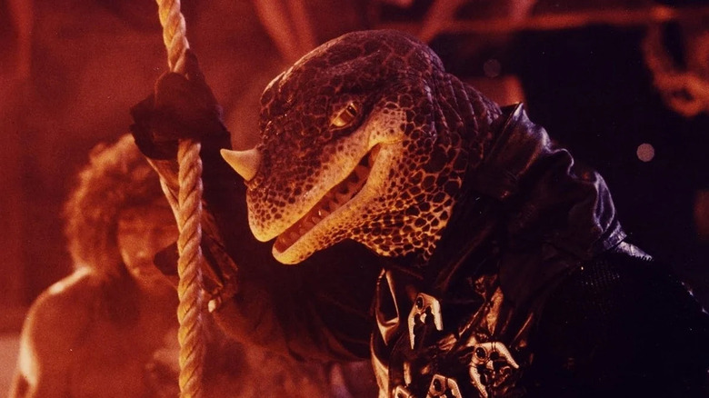 Mr. Big holding onto a rope in "Adventures in Dinosaur City."