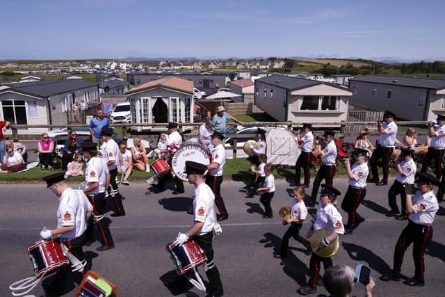 Orange lodges from Donegal, Cavan, Monaghan and Leitrim and thousands of visitors from Northern Ireland converged on the seaside village of Rossnowlagh on Saturday., including the Chambre Flute Band in full tune as it makes its way to the field. Photo: John McVitty/Press Eye