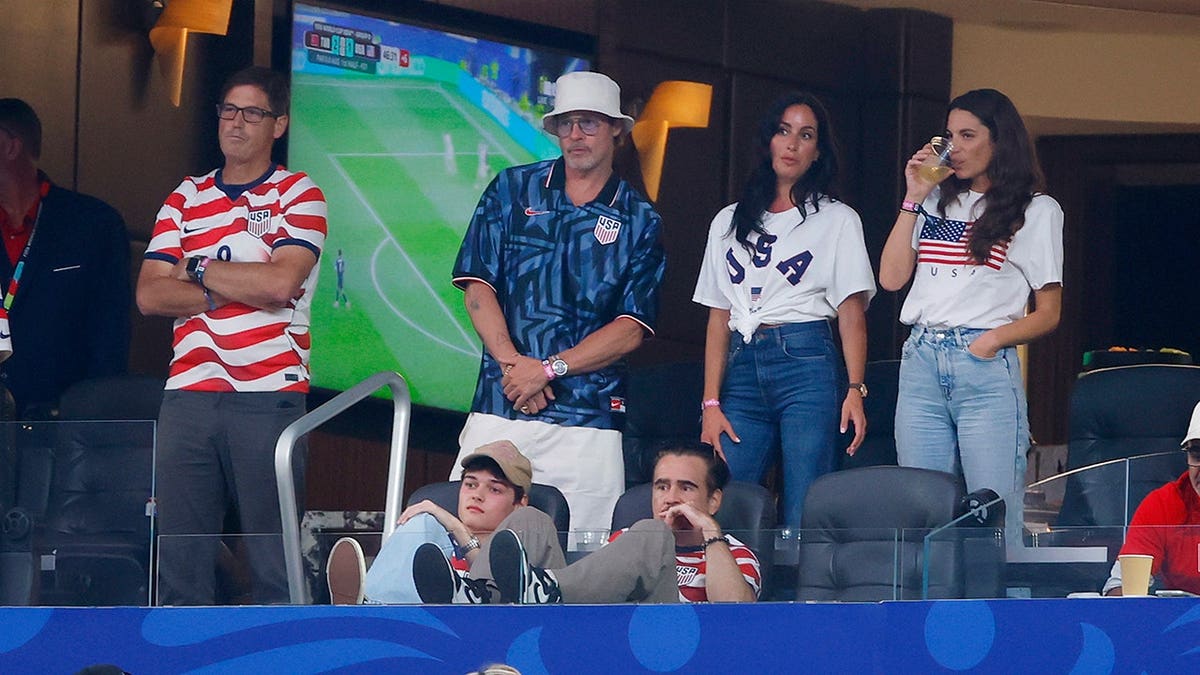 Brad Pitt and Collin Farrel at the match between Turkiye and the USA in June 2026.