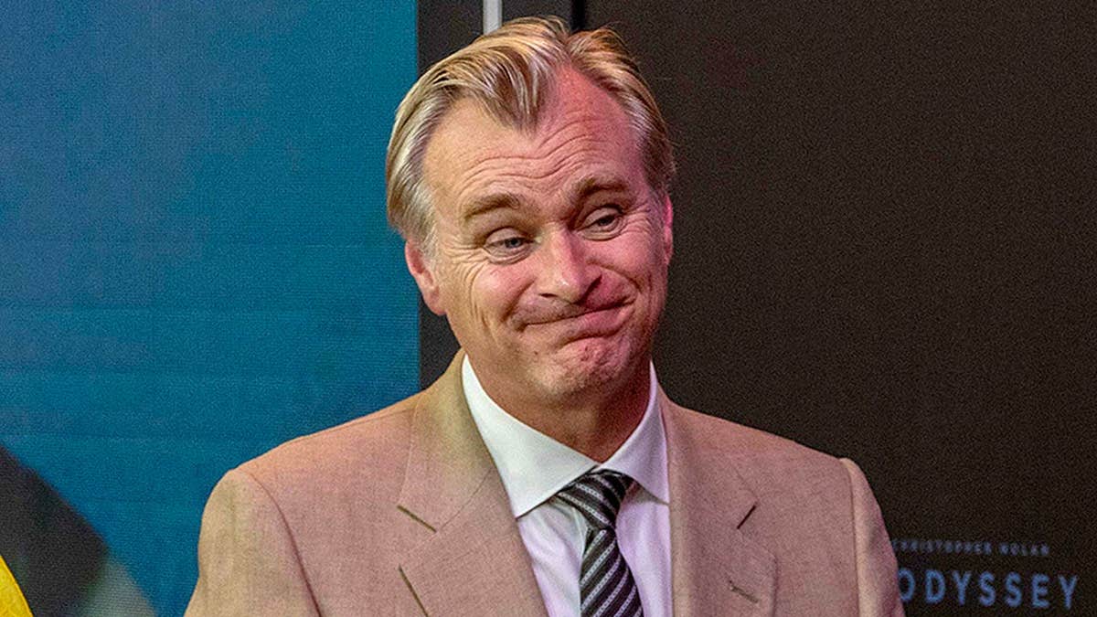 Christopher Nolan is seen on the red carpet of a screening for