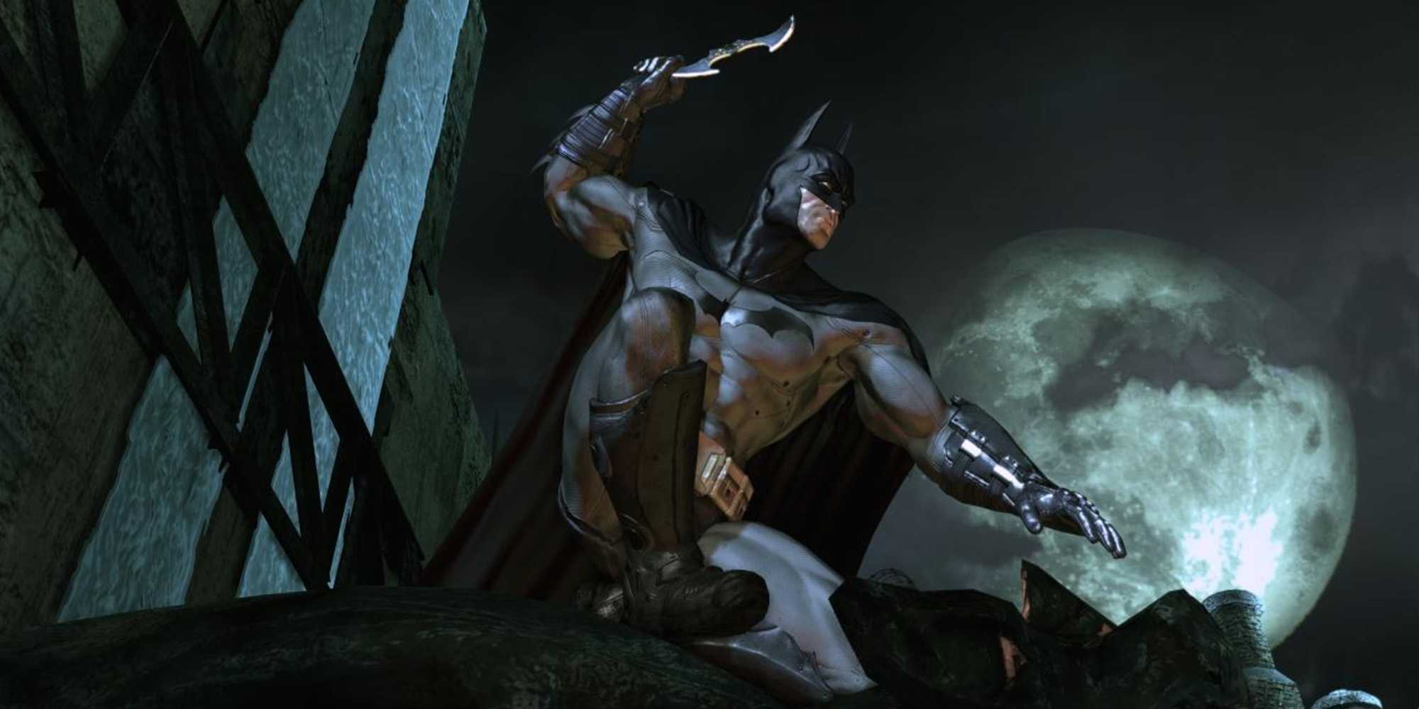 Batman (Kevin Conroy) raises a batarang in 'Batman: Arkham Asylum'