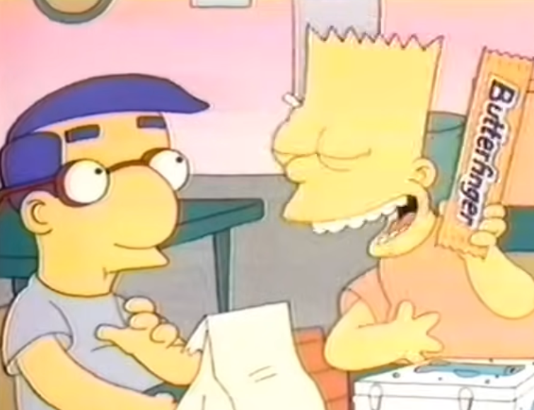 Bart Simpson holds a Butterfinger bar, smiling, while sitting with Milhouse at a table