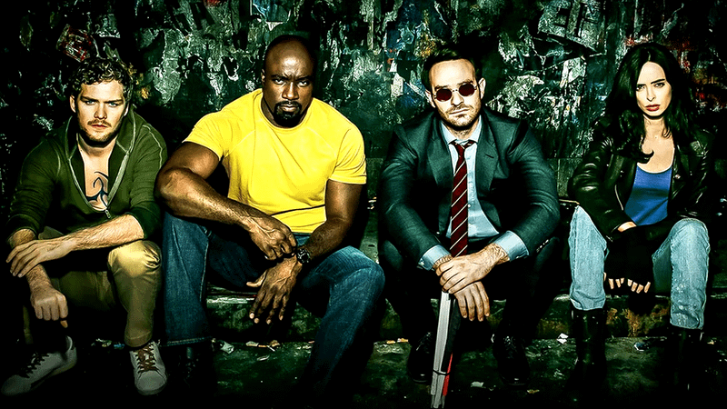 The Defenders sitting down in a promo image.
