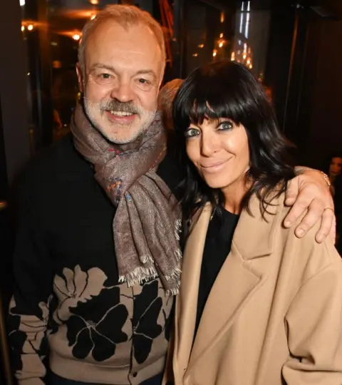 Getty Images Graham Norton and Claudia Winkleman attend the Gala Opening of "David Hockney: Bigger & Closer (not smaller & further away)" at Lightroom on February 21, 2023 in London, England.