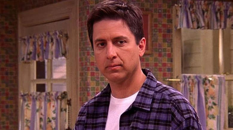 Ray Barone (Ray Romano) stands sullenly in his kitchen in Everybody Loves Raymond