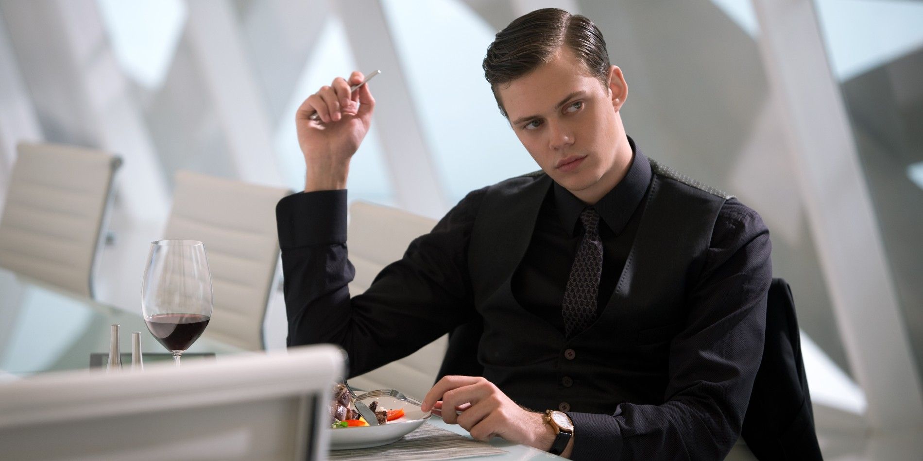 Bill Skarsgard as Roman in Hemlock Grove eating a fancy lunch