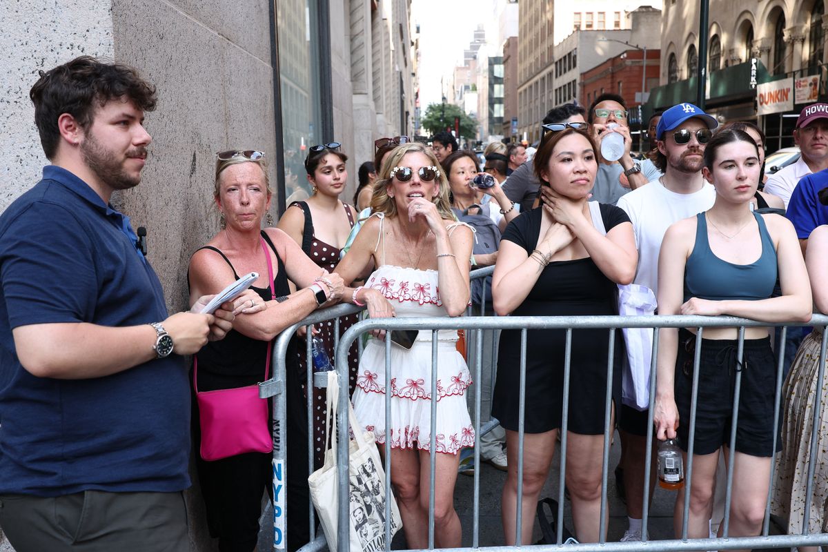 Fans stand outside Madison Square Garden