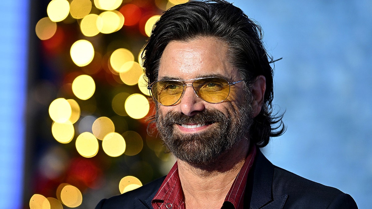'Full House' star John Stamos smiles during Fox & Friends performance