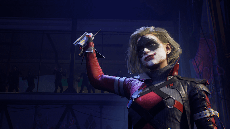Image from Gotham Knights video game showing Harley Quinn in full makeup holding up a device.