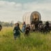 The Ingalls family runs across a prairie in 'Little House'