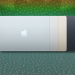 MacBook Airs on a colorful background