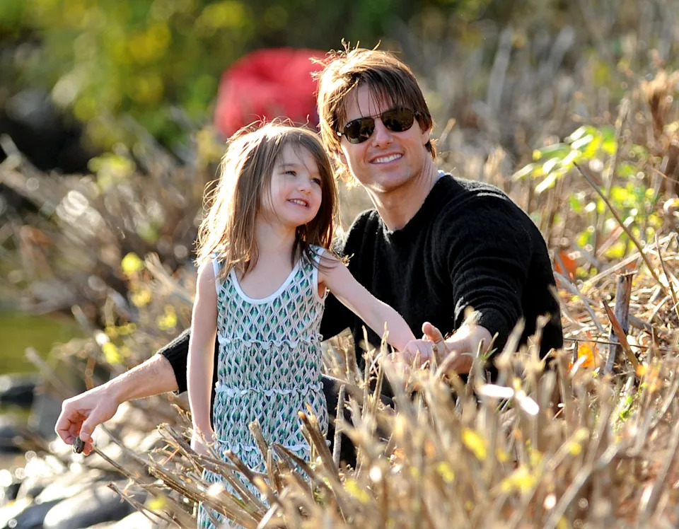 Suri Cruise and Tom Cruise visit Charles River Basin on October 10, 2009 in Cambridge, Massachusetts.