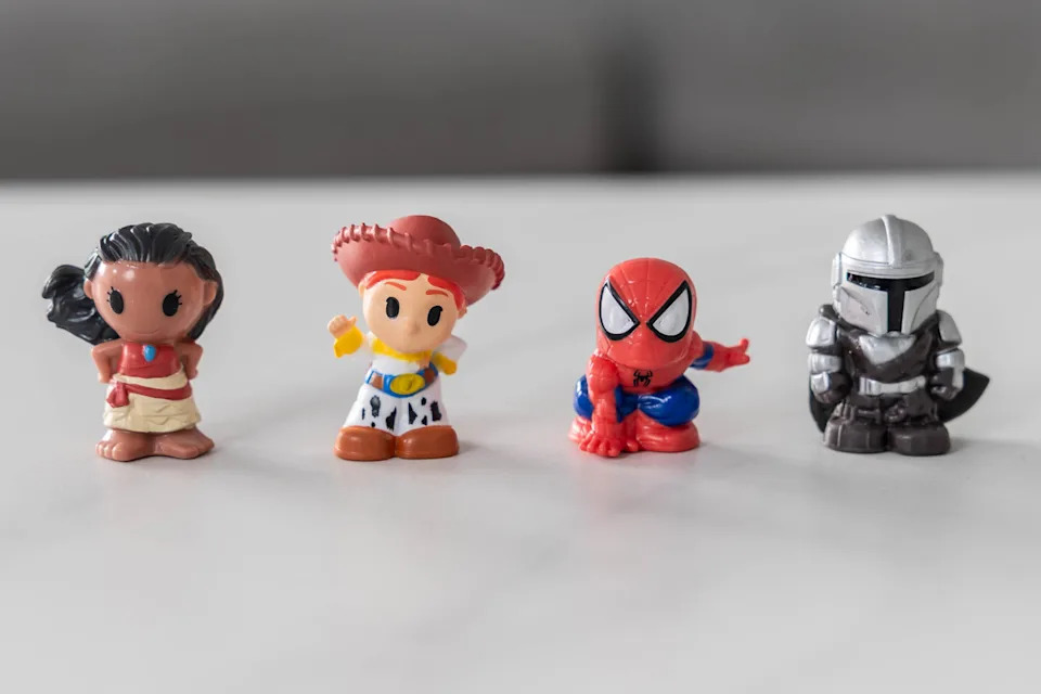 Four Ooshies, including Spider Man and Jessie from Toy Story