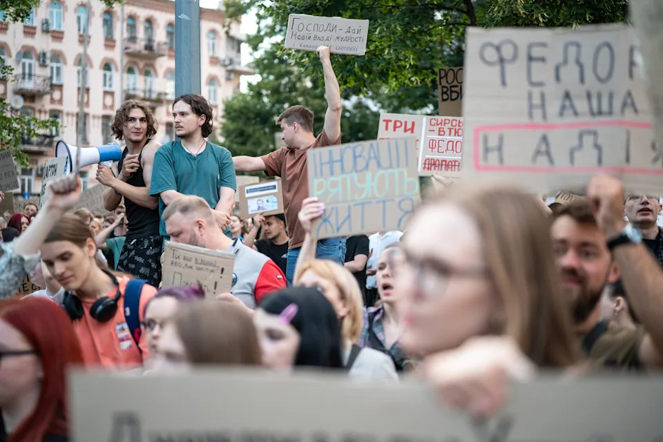 Ukrainians attend a rally demanding the reinstatement of Defense Minister Mykhailo Fedorov after his dismissal.