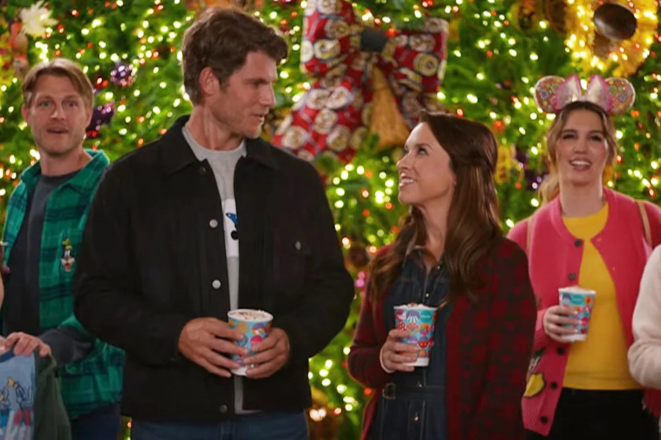 Travis Van Winkle, Lacey Chabert, and Christy Carlson Romano in 'Holiday Ever After: A Disney World Wish Come True'Credit: Hallmark Channel/YouTube