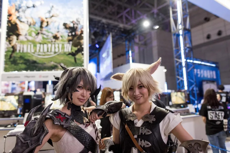CHIBA, JAPAN - SEPTEMBER 15 : A campaign model dressed as a character from Final Fantasy game poses for a visitor during the 2016 Tokyo Game Show at Makuhari Messe Convention Center in Chiba prefecture, east of Tokyo, Japan, 15 September 2016, asia's biggest gaming event kicked off. (Photo by Nicolas Datiche/Anadolu Agency/Getty Images)