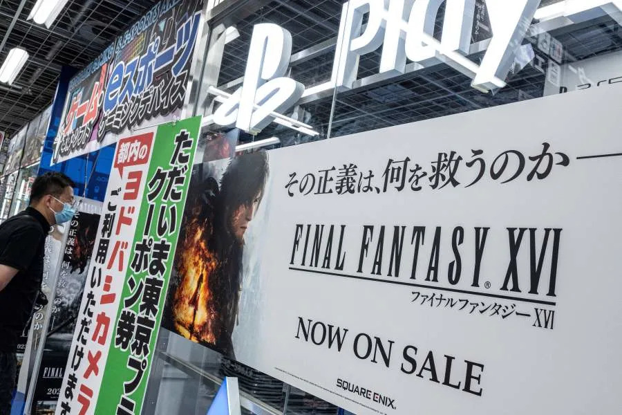 A man walks into the games department where Final Fantasy XVI - the latest version of the video game franchise developed and published by Square Enix - went on sale at an electronics store in central Tokyo on June 22, 2023. The eagerly awaited new game in the top-selling Final Fantasy franchise was released on June 22, with fans hailing its high-spec action graphics and grown-up storyline. (Photo by Richard A. Brooks / AFP) (Photo by RICHARD A. BROOKS/AFP via Getty Images)