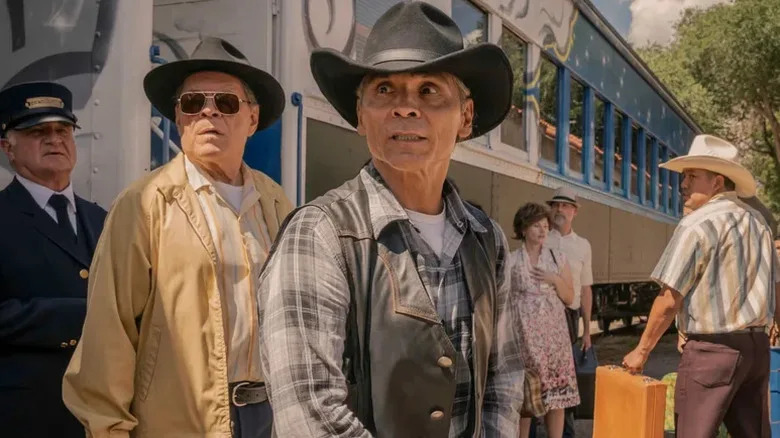 Lt. Joe Leaphorn and Sheriff Gordo beside a train on Dark Winds (2022-present)