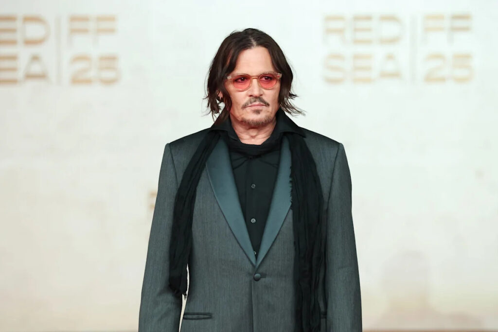 Johnny Depp Surprises Comic-Con Fans as Ebenezer Scrooge Ahead of New Movie Release